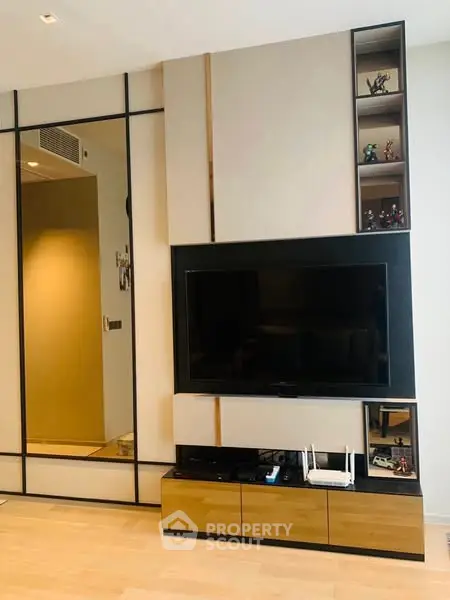 Modern living room with sleek TV unit and stylish decor