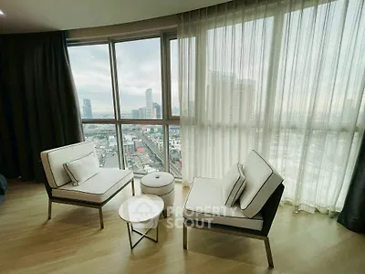 Modern living room with panoramic city view and stylish furniture