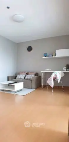 Modern living room with cozy sofa and stylish decor