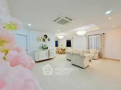 Luxurious living room with elegant decor and plush seating in a modern home