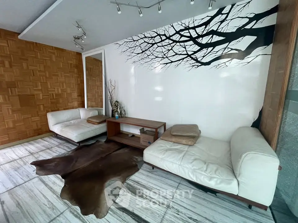 Stylish living room with modern decor and unique wall art