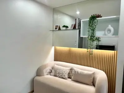 Modern living room with stylish sofa and decorative shelving