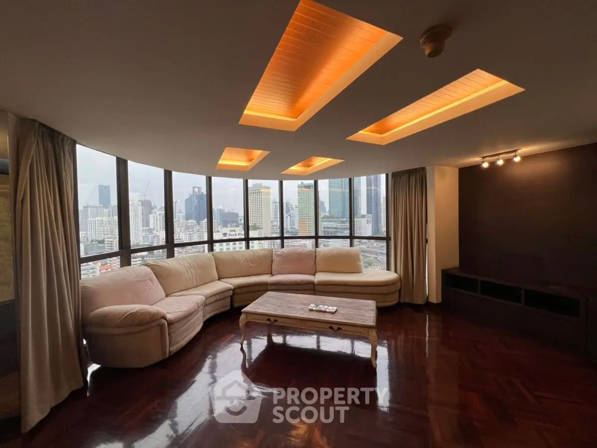 Luxurious living room with stunning city view and elegant lighting