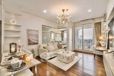Luxurious living room with elegant chandelier and balcony view