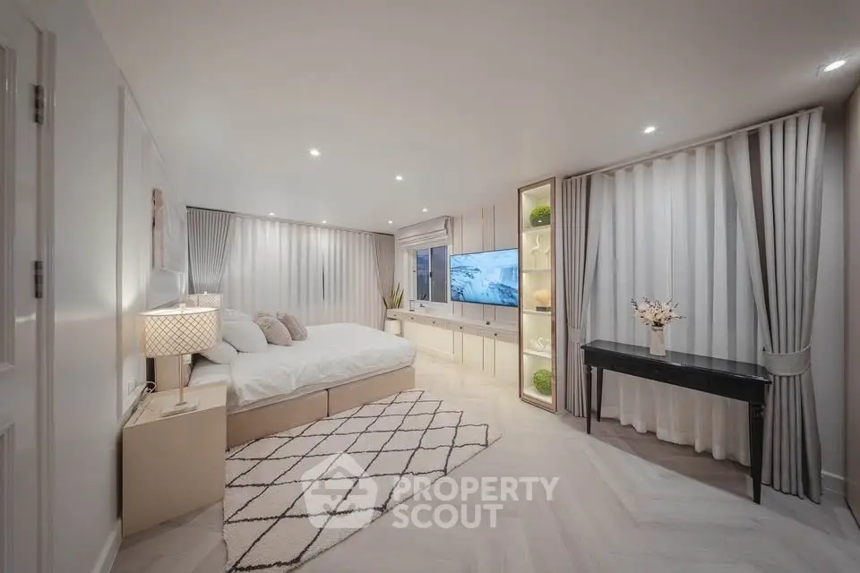 Luxurious modern bedroom with elegant decor and ambient lighting