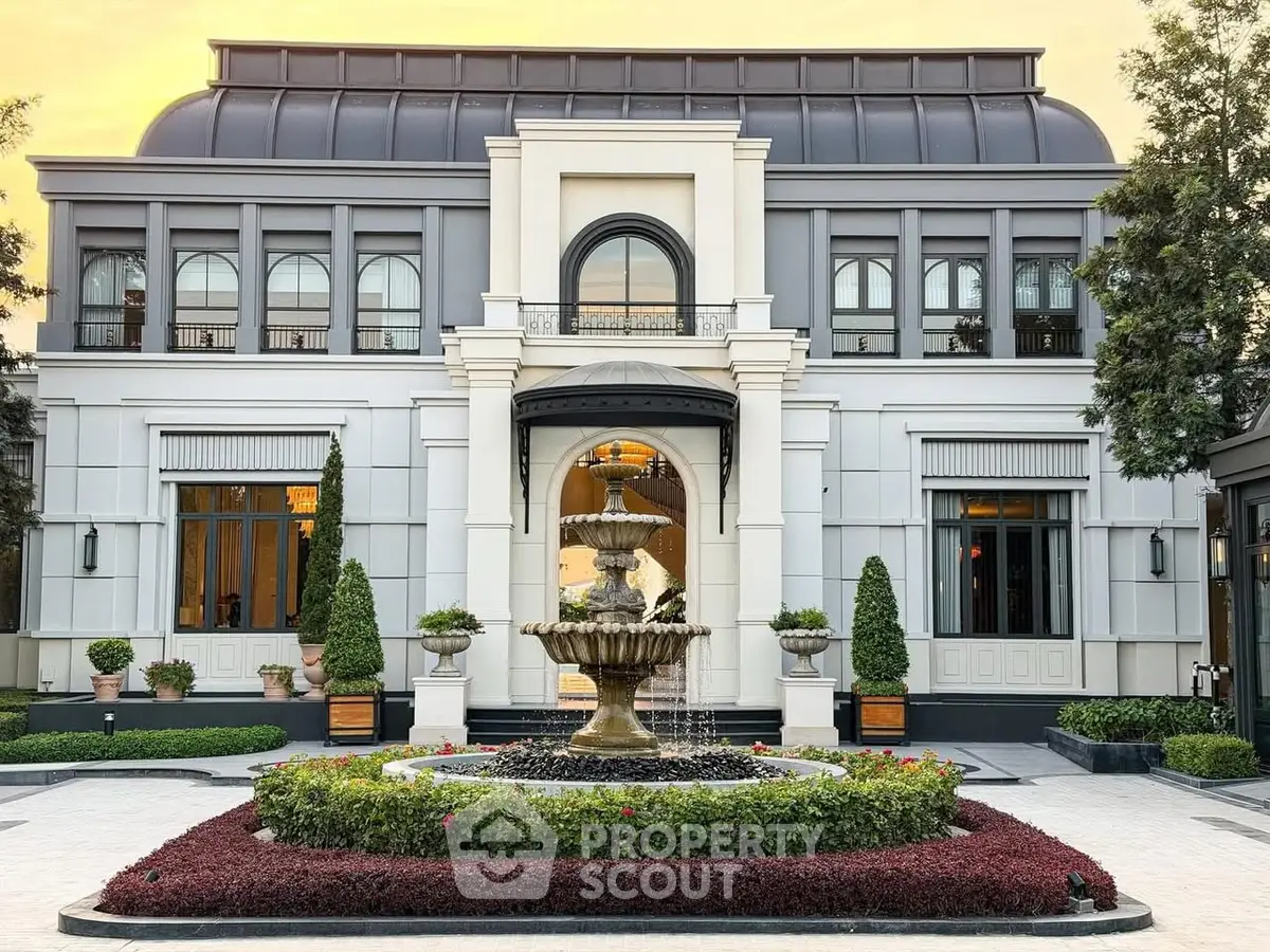 Luxurious mansion with elegant architecture and stunning fountain centerpiece