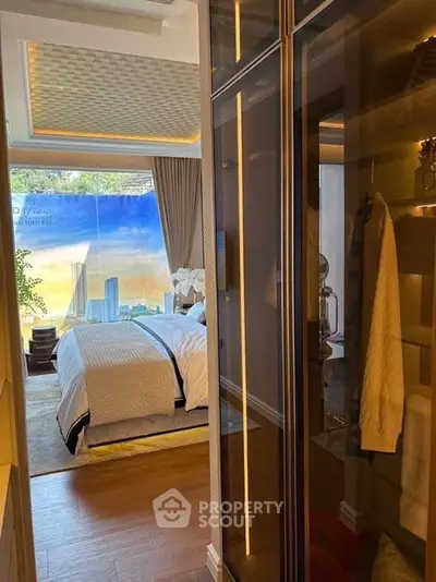 Luxurious bedroom with modern design and city view from window