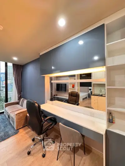 Modern living room with stylish workspace and city view