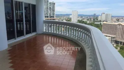 Spacious balcony with stunning city view in high-rise apartment