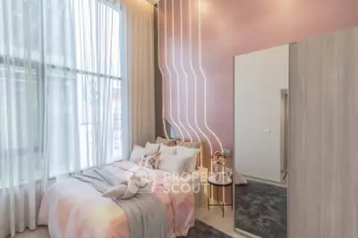 Stylish modern bedroom with elegant lighting and large window view