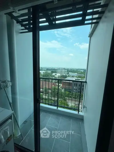 Charming balcony with stunning city view, perfect for relaxation and enjoying the skyline.