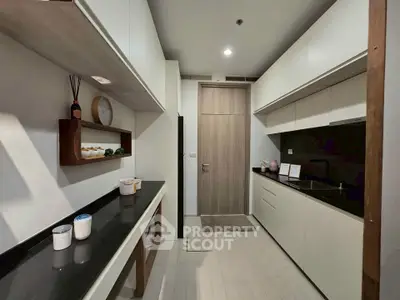 Modern kitchen with sleek cabinetry and minimalist design