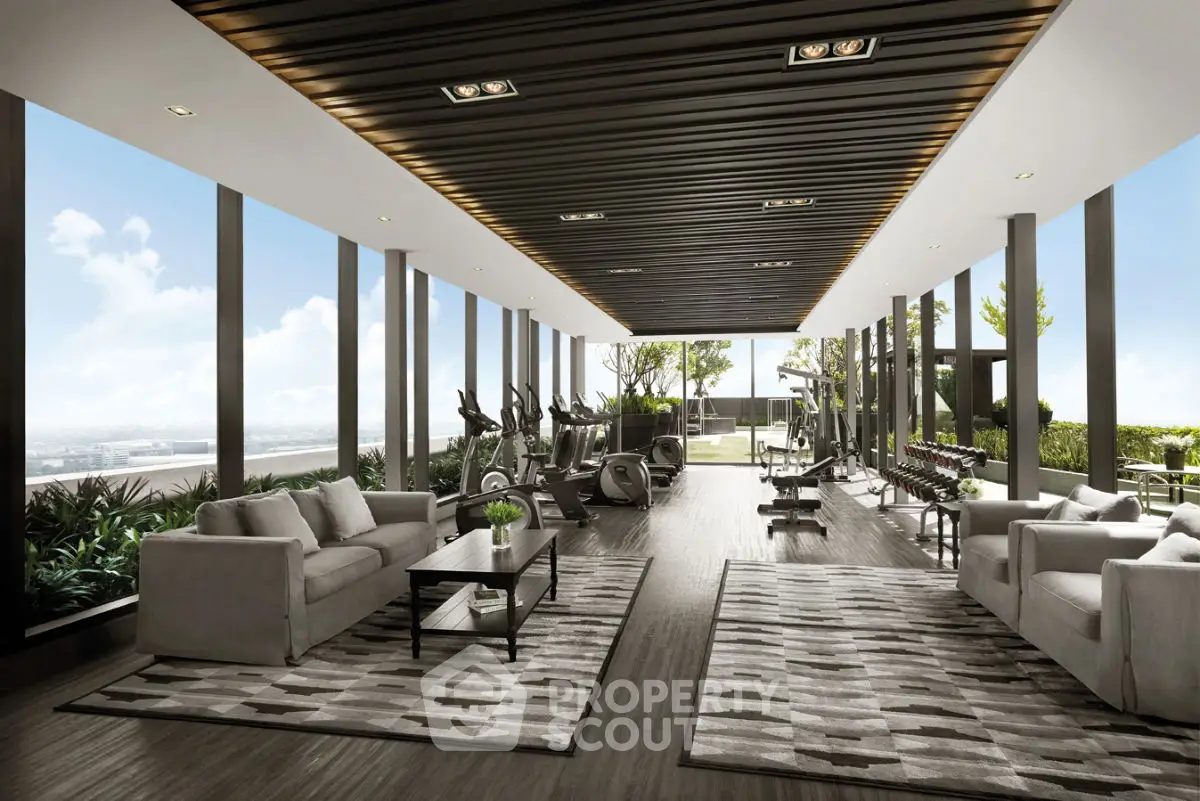 Luxurious rooftop gym with panoramic city views and modern fitness equipment.