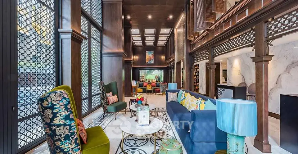 Luxurious living room with high ceilings, elegant decor, and vibrant furnishings in a sophisticated setting.