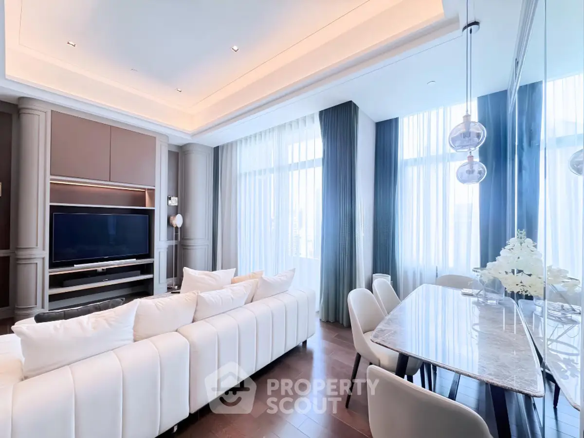 Luxurious modern living room with elegant dining area and large windows