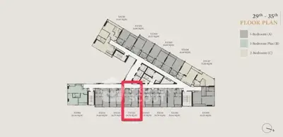 Floor plan of a multi-unit residential building highlighting a specific apartment layout.