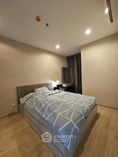 Modern bedroom with stylish decor and cozy ambiance