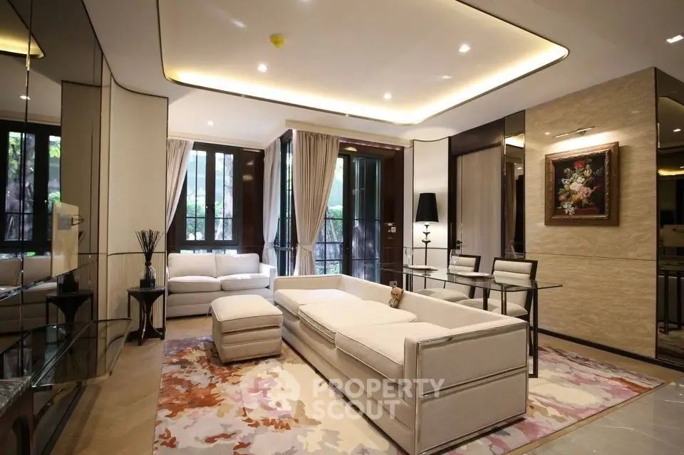 Luxurious modern living room with elegant decor and large windows