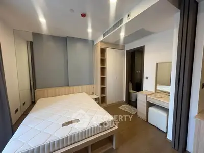 Modern bedroom with built-in wardrobe and stylish decor