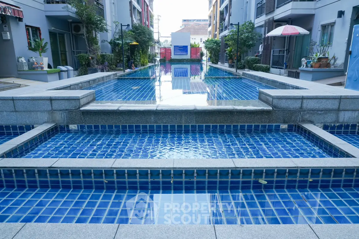 Luxurious residential pool area with modern design and serene ambiance