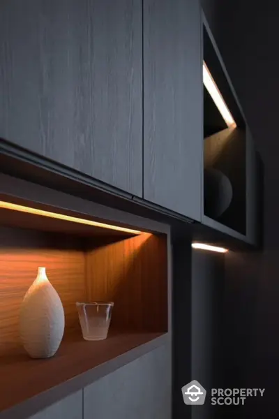 Modern interior shelving with ambient lighting and decorative vases