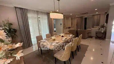 Luxurious dining room with elegant decor and spacious seating in modern home
