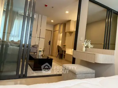 Modern apartment interior with stylish living room and cozy bedroom