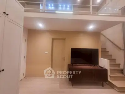 Modern living room with loft design and sleek wooden furniture
