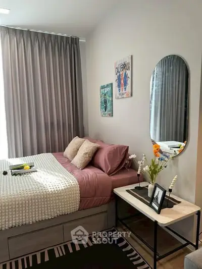 Cozy bedroom with modern decor and stylish mirror