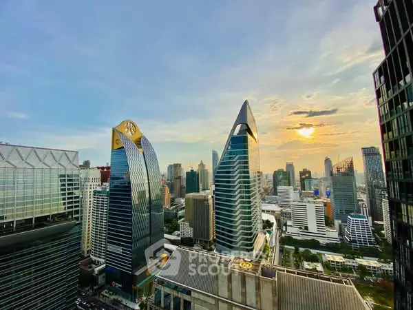 Stunning cityscape view with iconic skyscrapers at sunset, showcasing urban architectural marvels.