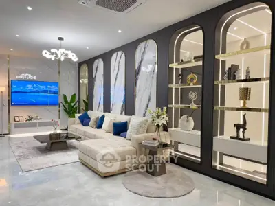 Luxurious modern living room with elegant decor and plush seating, perfect for relaxation and entertainment.