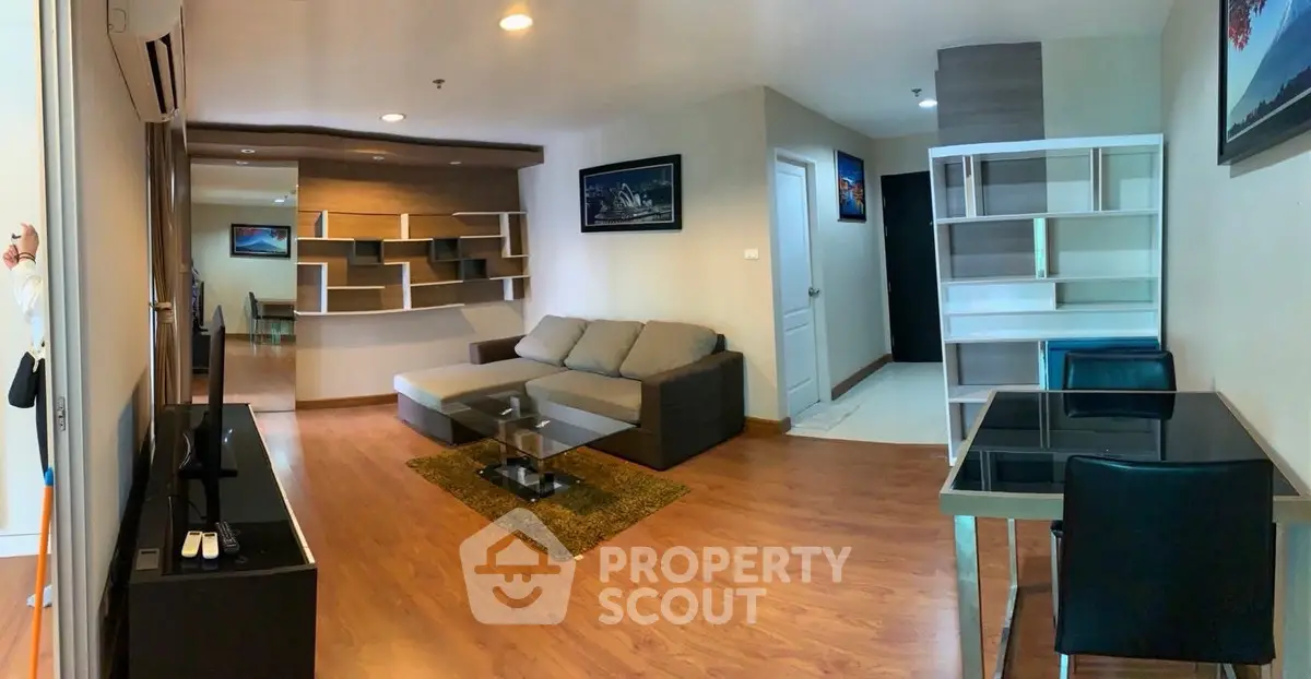 Spacious modern living room with stylish furniture and open layout