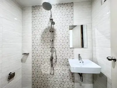 Modern bathroom with stylish tile design and sleek fixtures
