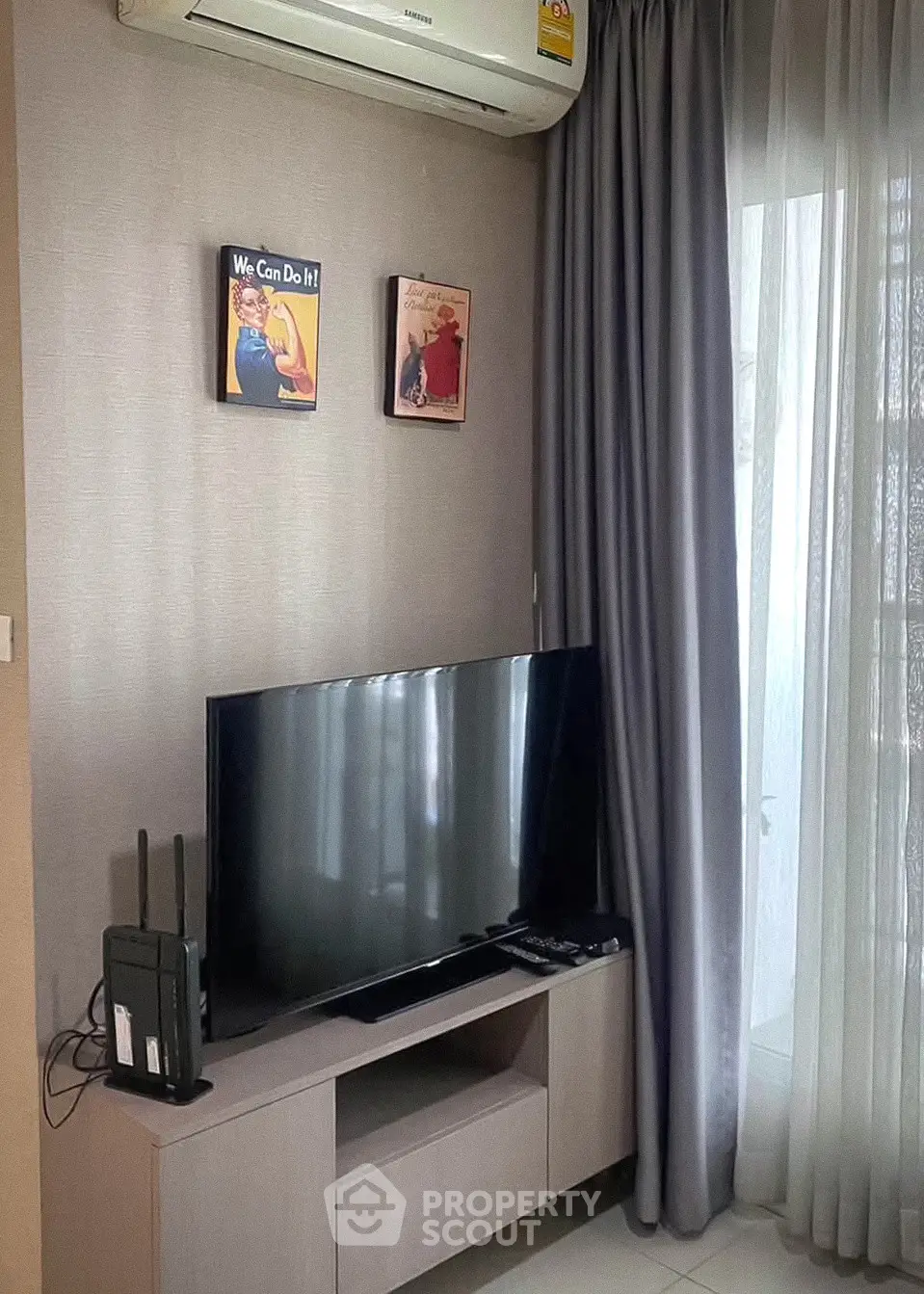 Modern living room with sleek TV setup and stylish decor