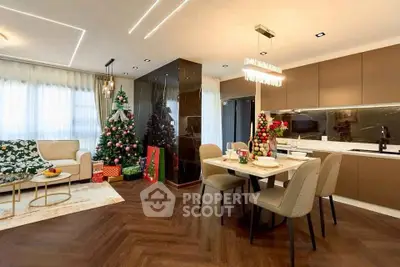 Modern living room with Christmas decor and open kitchen layout