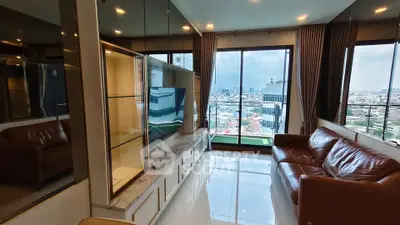 Luxurious living room with stunning city view and elegant leather sofa