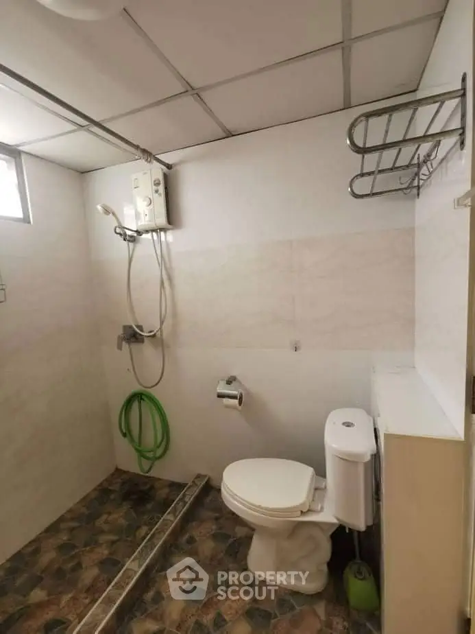 Modern bathroom with sleek fixtures and contemporary design.