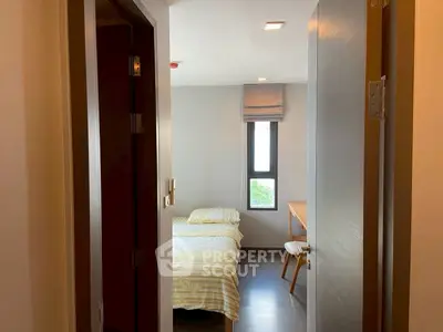 Cozy bedroom with natural light and modern furnishings