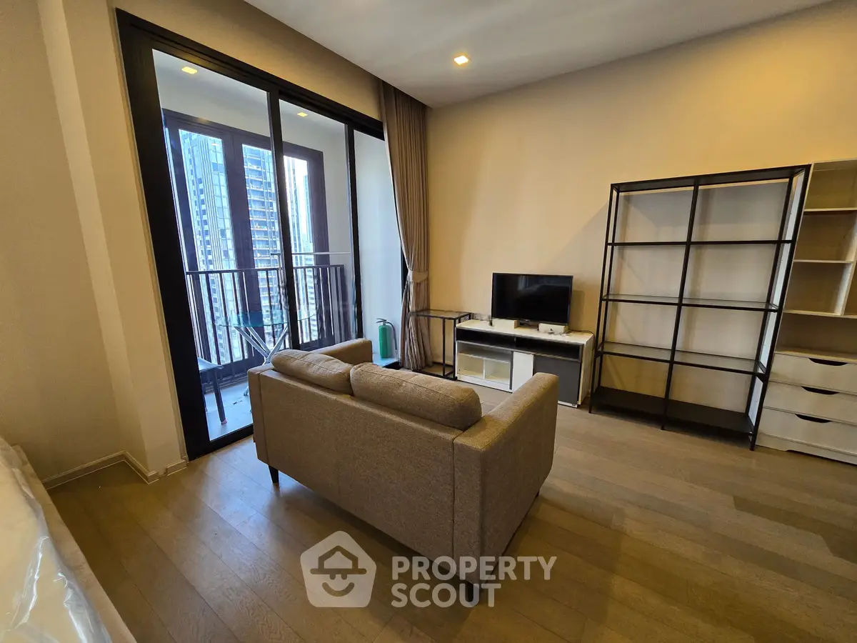 Modern living room with balcony view in urban apartment
