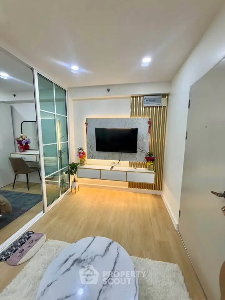 Modern living room with stylish TV setup and elegant decor