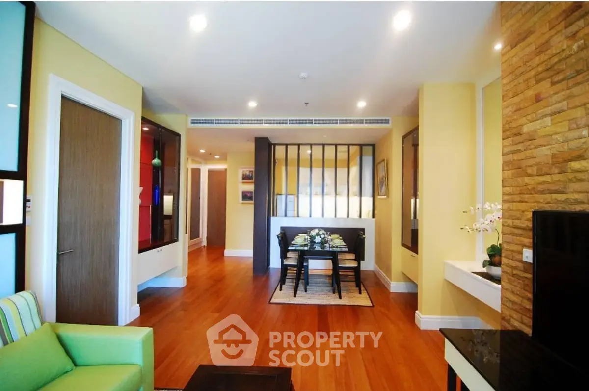 Spacious living room with elegant dining area and modern decor