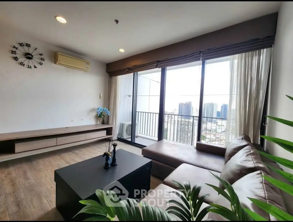 Modern living room with city view and stylish furniture