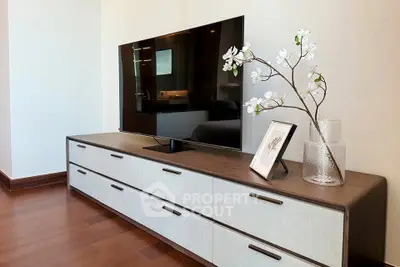 Modern living room with sleek TV stand and elegant decor
