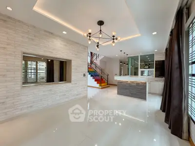 Spacious modern living room with elegant lighting and open layout