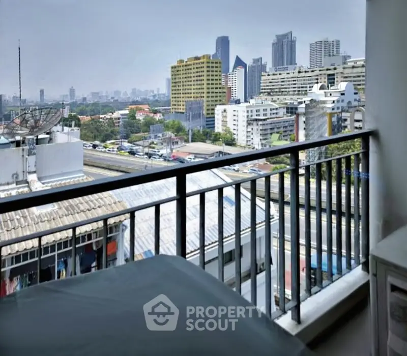 Stunning cityscape view from a modern apartment balcony, perfect for urban living enthusiasts.