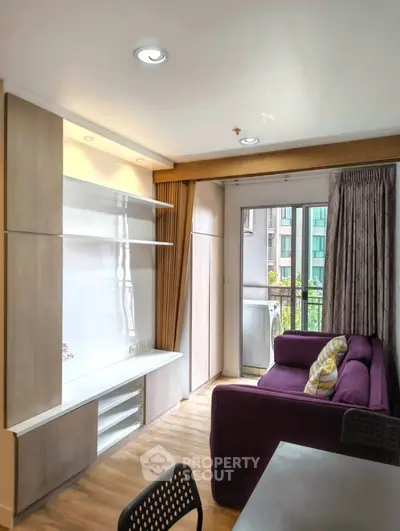 Modern living room with purple sofa and balcony view in urban apartment