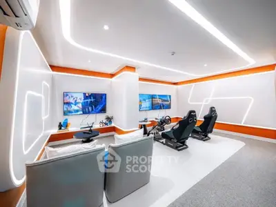 Modern gaming room with sleek design and high-tech features, perfect for entertainment enthusiasts.