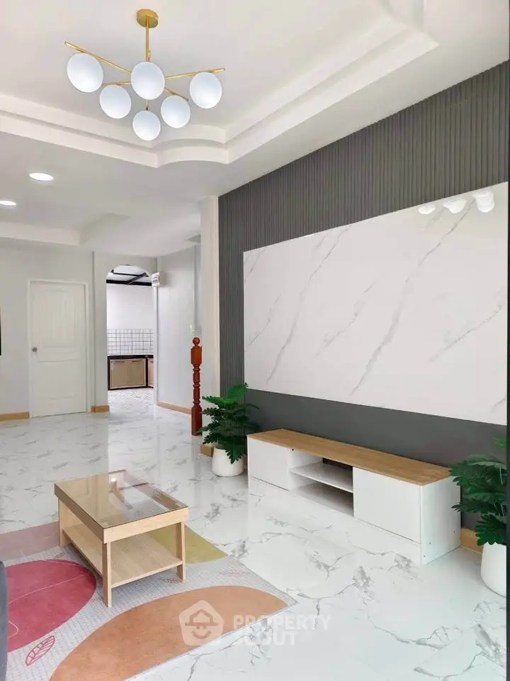 Modern living room with marble flooring and stylish lighting