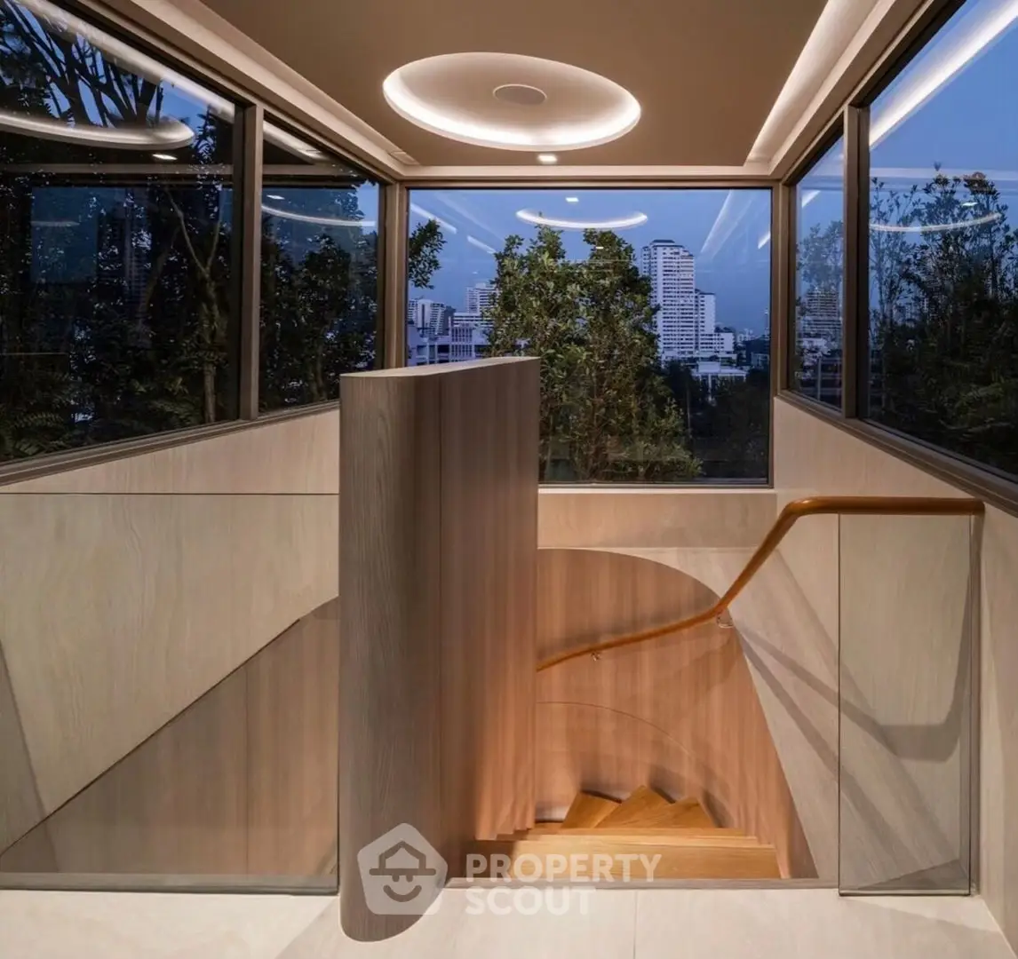 Luxurious modern staircase with panoramic city view and elegant lighting