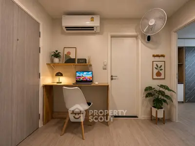 Modern study nook with desk, chair, and laptop in stylish apartment interior.
